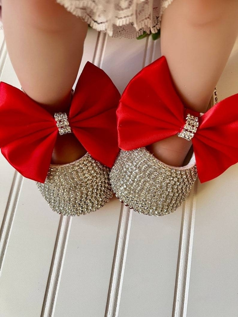 Sparkling Silver Baby Shoes with Red Bow